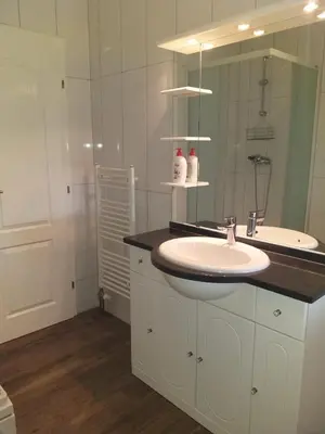 a bathroom with a sink and a mirror at Ivan in Livno