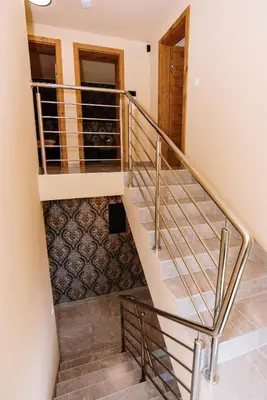 a staircase in a house with a stair case at Casa Lumi in Bugojno