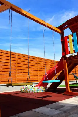 a playground with a slide and some balls at Villa Crystal in Bihać