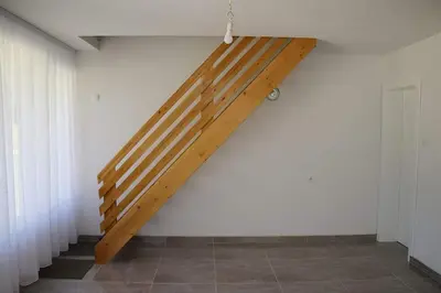 a wooden ramp on the wall of a room at Vikendica Gajić in Šipovo
