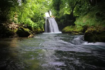 a waterfall in the middle of a river at Vikendica Gajić in Šipovo