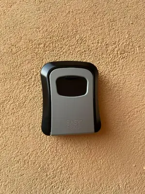 a black and gray object on the side of a wall at Appartement Nada in Bosanski Brod