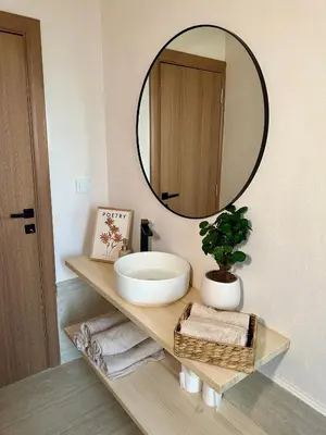 a bathroom with a sink and a mirror at Kuca Oste in Banja Luka