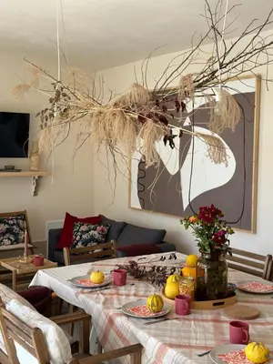 a dining room with a table with fruit on it at Kuca Oste in Banja Luka