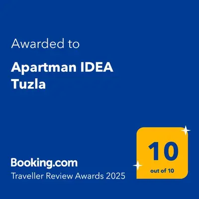 a yellow sign with the text awarded to armenian ideza tula at Apartman IDEA Tuzla in Tuzla