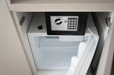 an open refrigerator with a safe inside of it at Lala in Bosanska Krupa