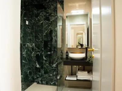 a bathroom with a sink and a mirror at Lala in Bosanska Krupa