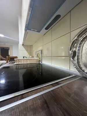an empty room with a table and a mirror at Apartment Poturmahala 2 in Travnik