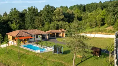an aerial view of a house with a swimming pool at Villa, Vikendica - Sunny Hill - jacuzzi, sauna in Banja Luka