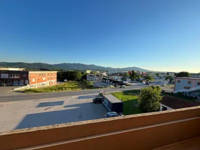 a view of a city street from a balcony at Apartment M&S Gračanica in Gračanica