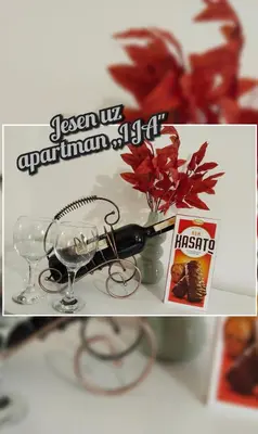 a picture of a pair of scissors and wine glasses at Apartman IJA in Banja Luka