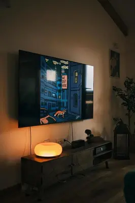 a flat screen tv on a wall in a living room at Ikigai Penthouse Apartment in Banja Luka