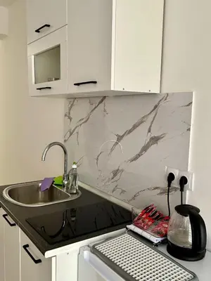 a kitchen with a sink and a counter top at Jelena in Jajce