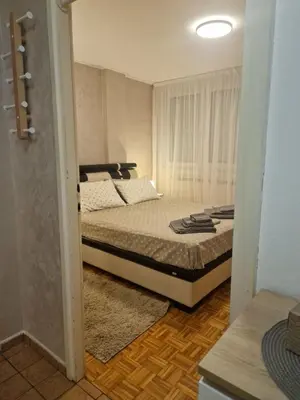 a bedroom with a bed in a room at Apartman Tanja in Banja Luka