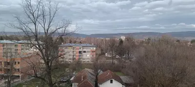 a view of a city with buildings and trees at WUGE Bihac in Bihać