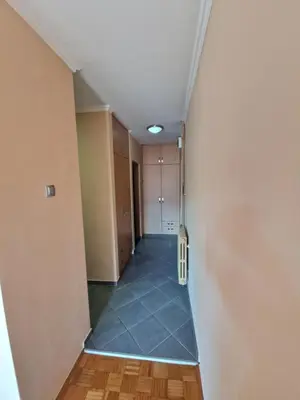 an empty hallway with a hallway at Cozy in Zenica