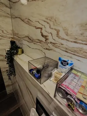 a bathroom with a marble counter top with a sink at Diamond Stan na Dan in Kiseljak