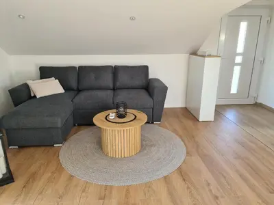 a living room with a couch and a coffee table at Dora in Livno
