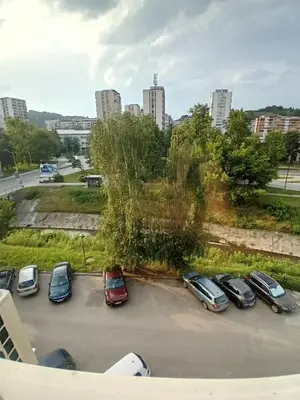 a view of a parking lot with cars parked at AS Emporio Omega 2 in Tuzla
