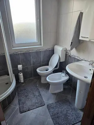 a bathroom with a toilet and a sink at Apartman D&A in Šišava