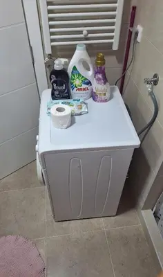 a white bathroom counter with toiletries on it at Premium in Doboj
