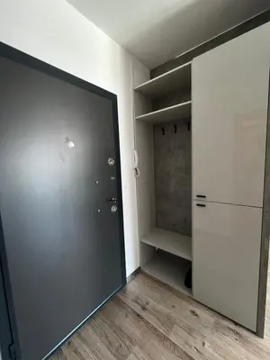 an empty room with a door and a closet at Apartman Dioniz Fojnica in Fojnica