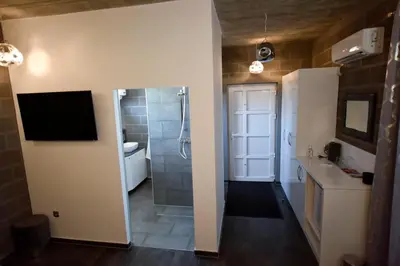 a bathroom with a shower and a sink at Apartmani i Bungalovi TROJKA in Banja Luka