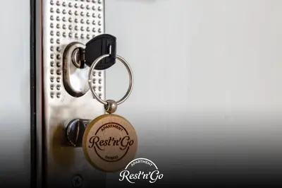 a key chain attached to a metal door at Apartman Rest 'n' Go in Doboj