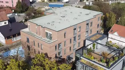 an overhead view of a building with a roof at Apartman City Centar Banjaluka in Banja Luka