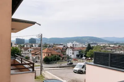 a view of a city with cars parked in a parking lot at BDD House in Banja Luka