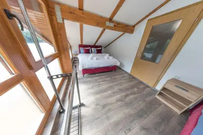 a bedroom with a bed in a attic at Holiday Homes Mujo Bejzin in Račić