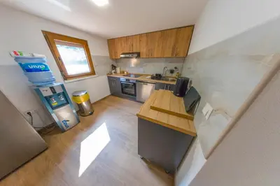an overhead view of a small kitchen with a desk at Holiday Homes Mujo Bejzin in Račić
