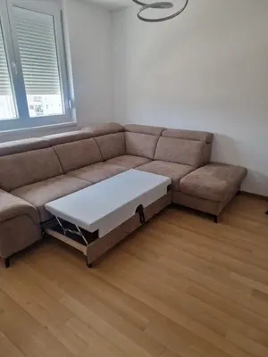 a living room with a couch with a coffee table at Apartman Giro in Banja Luka