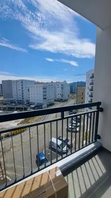 a balcony with a view of a parking lot at Apartman Giro in Banja Luka