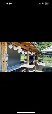 two pictures of a table and a roof with a plane at Hacijenda Simic in Krupa na Vrbasu