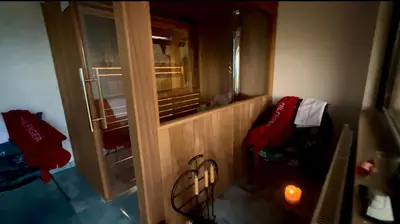 a room with a window and a chair in it at BellaVista Prokosko Jezero in Paljike