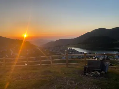 a view of the sunset from the top of a hill at BellaVista Prokosko Jezero in Paljike
