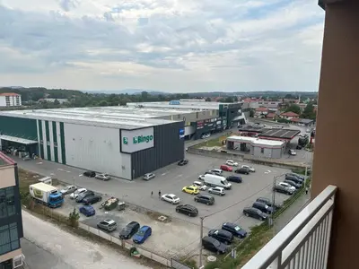 an aerial view of a parking lot with cars parked at Stan Živinice in Živinice