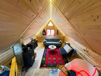 an overhead view of a living room in a log cabin at BellaVista Srce Prokosko Jezero in Fojnica