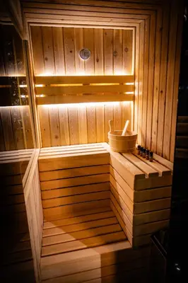 a wooden sauna with a light on top of it at Spa centar LUX Doboj in Doboj