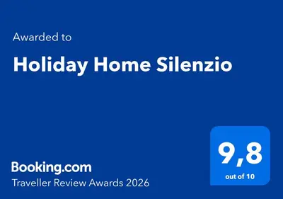 a blue sign with the words holiday home sigma at Holiday Home Silenzio in Bihać