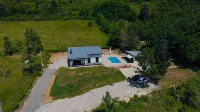 an aerial view of a house with a pool at Holiday Home Silenzio in Bihać