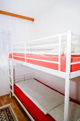 a couple of bunk beds in a room at Apartman ATLAS in Jajce