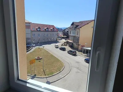 a view of a street from a window at Apartman Mia Kupres in Kupres