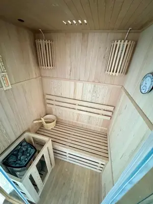 an overhead view of a sauna with a clock at Residence La Femme in Tuzla