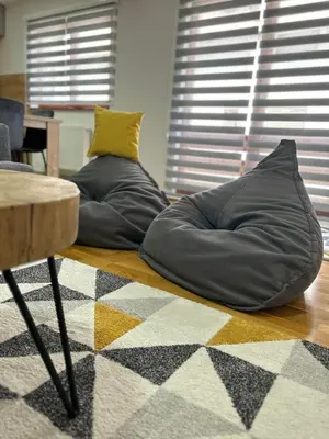 two pillows sitting on the floor in a living room at Montis Vlasic Apartment 2 in Vlasic