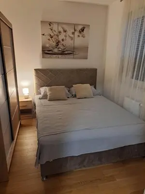 a bedroom with a bed in a room at Real Dream in Prijedor
