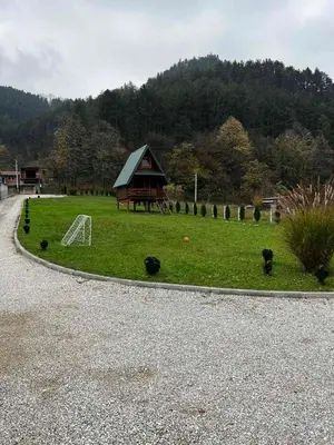a small gazebo in the middle of a park at Villa Bella Una-Apartman in Ostrožac