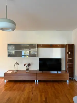 a living room with a large flat screen tv at Apartman Siesta in Kiseljak