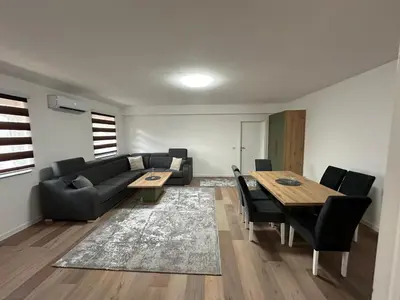 a living room with a couch and a table at Luxury Pyramid Apartment II Visoko in Visoko